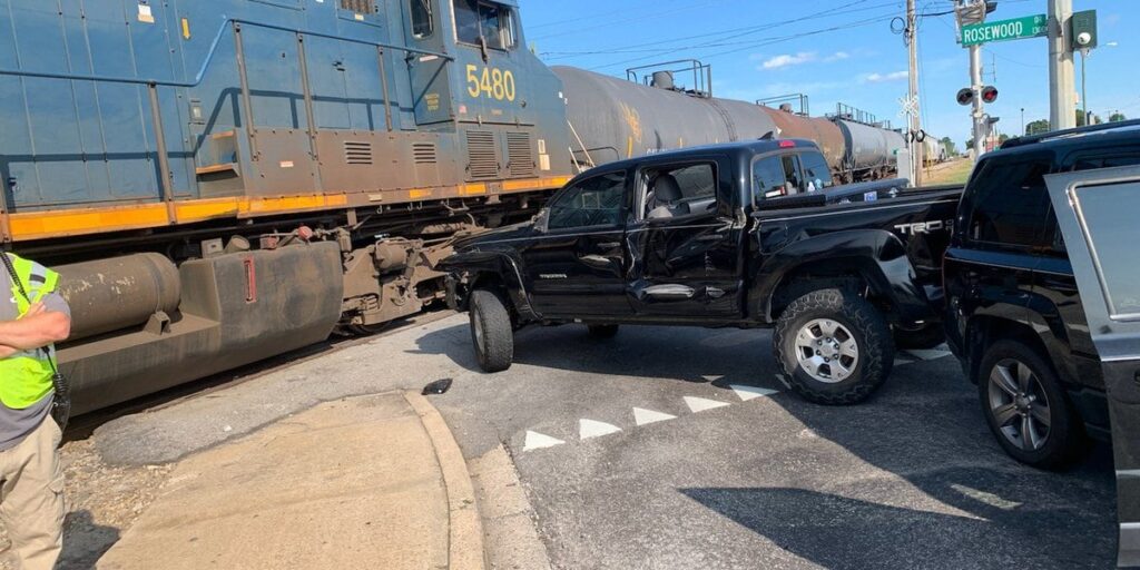 Rosewood near Assembly temporarily closed due to vehicle collision with train