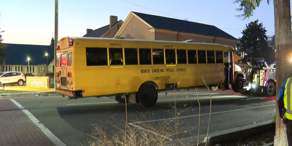 SUV driver charged after crash with school bus in Wilmington